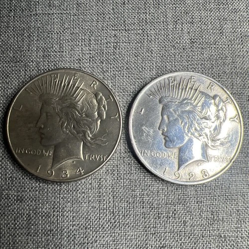 Lot Of 2 - 1923/1934 Peace Silver Dollars.  Key Date. AU/BU++