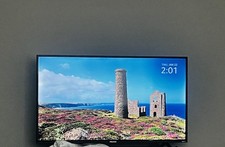 Hisense Flat Screen TV Black with Landscape Screensaver