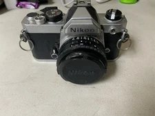 (Exc 4+) Nikon FM 35mm Film SLR Camera with 50mm 1.8 Prime. No Batt