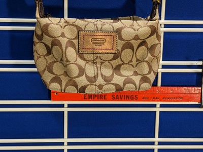 coach purse with purple lining