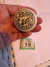 boots cash chemist butoon pot lid approx 2" across