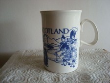 DUNOON MUG DECORATED WITH HIGHLAND CATTLE & MEN IN KILTS MADE IN SCOTLAND