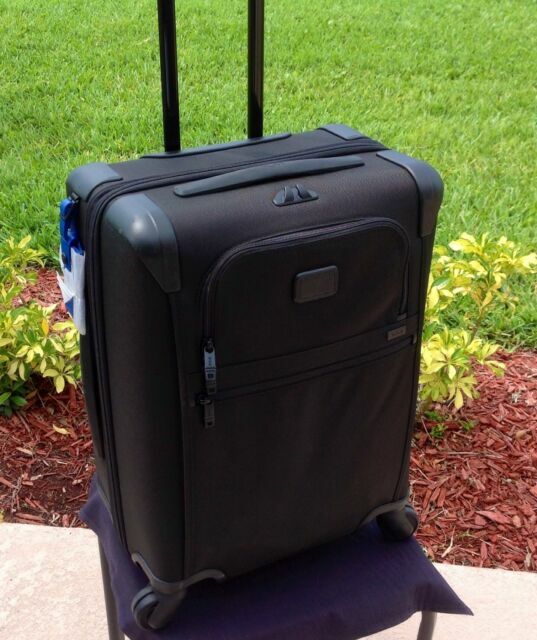 4 wheel carry on suitcase