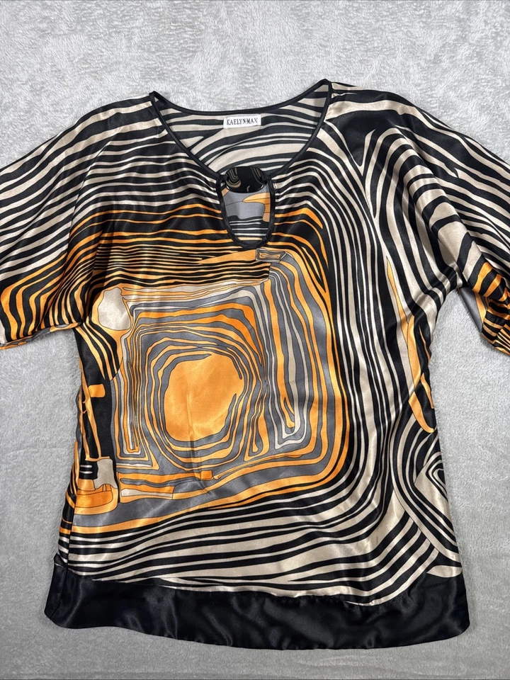 Blusa para mujer Kaelyn Max multicolor geométrica a rayas manga 3/4 talla mediana Foto 2 de 4