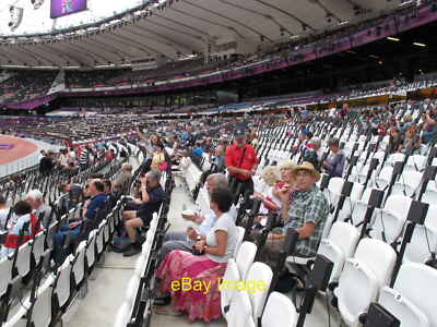 Photo 12x8 Olympic stadium seats with light paddles To create light displa c2012