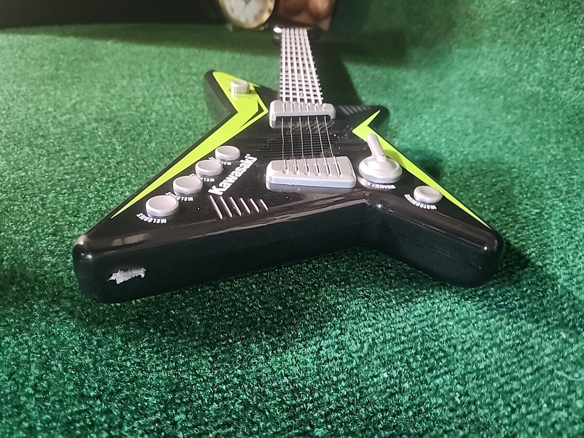 Vintage 1990's Kawasaki Toy Guitar Green and Black Tested Vintage 1990's Kawasaki Toy Guitar Green and Black Tested