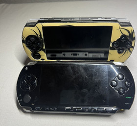 Lot of 2 Sony PSP 1001 Consoles Untested 2 Black And Grey Untested As Is