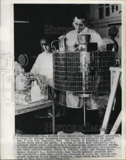 1963 Press Photo George Procter & Vincent Russo inspect satellite "Syncom"