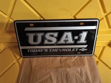 ORIGINAL BLACK USA1 License LIVE IT Tag From CHEVY DEALER for Showroom Cars 1986
