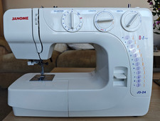 Janome J3-24 Sewing Machine with carry case and original accessories