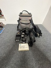 Minolta Maxxum 7000 35mm SLR Film Camera Kit with Lenses, Sunpak Flash, and Bag