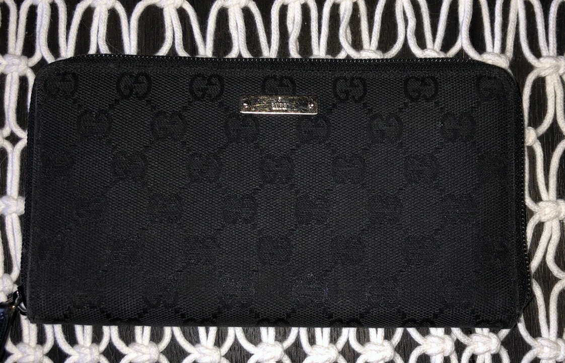 Portefeuille zippé Gucci Supreme en toile noir 