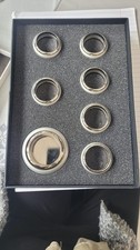 Silver plate napkin rings, unused, set of 7 silver plate napkin rings