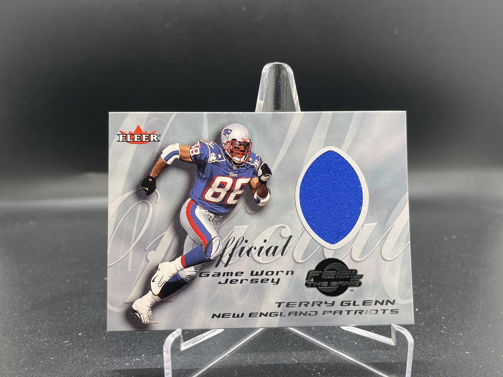 Terry Glenn #NNO 2000 Fleer Tradition Football Feel the Game
