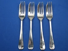 Four stainless Sheffield England 18/8 cocktail fish forks rat tail ridge BS 5577