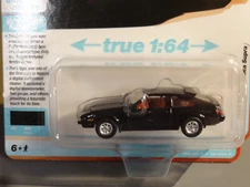 AUTO WORLD PREMIUM - IMPORT LEGENDS - BLACK -  1983 TOYOTA CELICA SUPRA