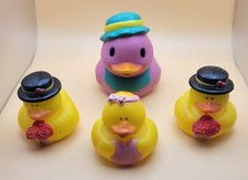 4 Rubber Ducky Toys - 2 with Hats, 1 with Pink Bow, 1 Purple Squirt Toy JEEP