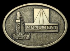 QE12138 GREAT VINTAGE 1978  MONUMENT  OIL RIG SOLID BRASS OILFIELD BUCKLE