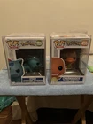 Pokémon Ivysaur and Charmander Funko Pops.