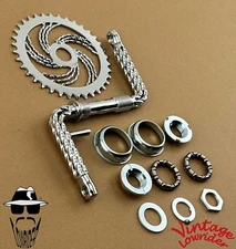 VINTAGE LOWRIDER QUADRUPLE TWISTED 1 PIECE CHROME CRANK W/TWISTED SPROCKET & B.B