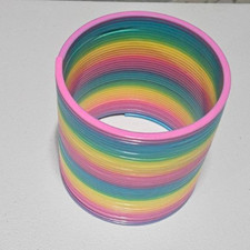 Rainbow Multi-Colored Large Plastic SLINKY Great condition 6  x6  Used But clean