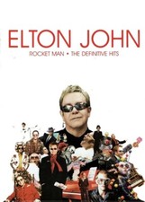 ELTO JOHN - 'ROCKET MAN' THE DEFINITIVE HITS -CD/DVD/BOOK
