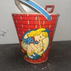 Vintage Ohio Art tin Toys . Sand Buck With Shovel