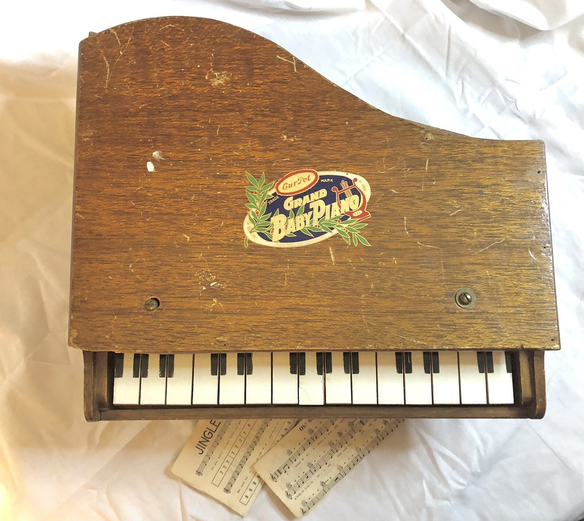 Antique “Cur Pet Baby Grand Piano” - 15 Numbered & Covered Wood