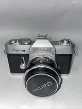 Canon Pellix QL 35mm camera w/FL 50mm f/1.8 lens Excellent Condition--Works