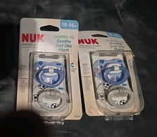 Two packs of two- Nuk Orthodontic Shape Pacifiers, 6-18 Months, W/Case