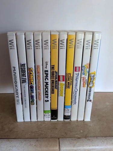 Nintendo Wii Game Lot.  11 Games. Includes Mario Kart and Resident Evil game.