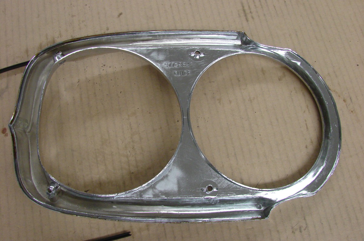1964 CATALINA BONNEVILLE NOS GM HEAD LIGHT BEZEL 9775069 PONTIAC