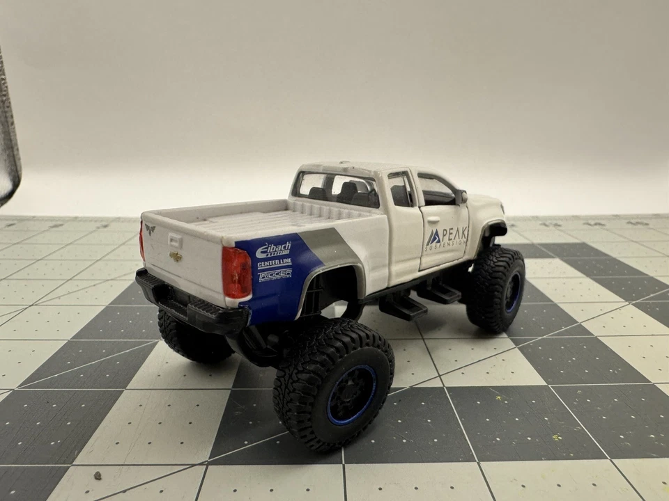 Maisto 2017 Chevrolet Colodado ZR2 Pickup Truck, White "PEAK Suspension" - 1/48 - Image 3 of 4