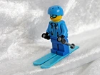LEGO CITY MINIFIGURE  FEMALE SKIER c/w SKIS POLES and HELMET SEE PICTURES & DESC