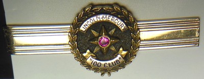 LINCOLN MERCURY 1/10 10K Co.''100 CLUB'' service award tie clasp advertising