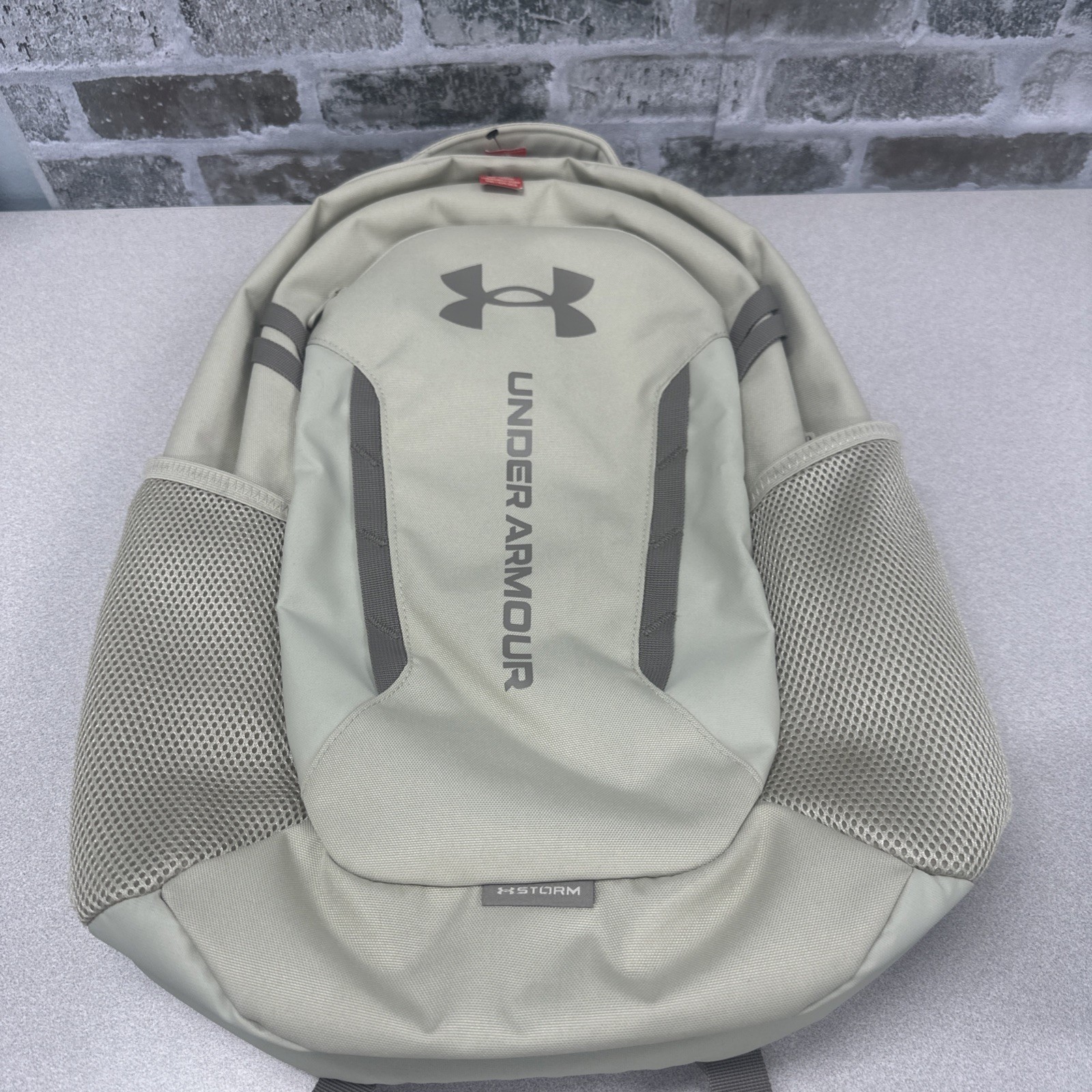 Under Armour 1384672 Hustle 6.0 Backpack  Tan