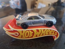 HOT WHEELS CUSTOM:  WHEEL SWAPPED  NISSAN SKY...