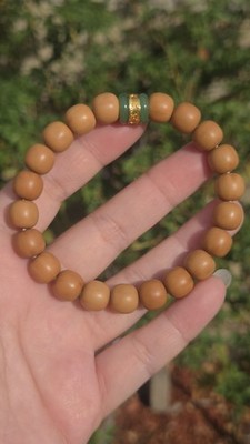 Natural 10mm 'Monkey Head' Walnut Bracelet | Barrel Beads with Green Jade Accent