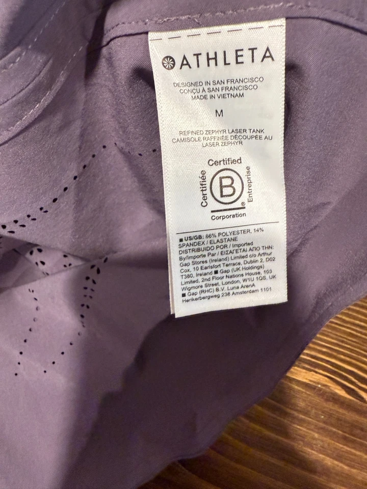 Camiseta sin mangas Athleta Zephyr corte láser para mujer M poliéster violeta cuello redondo ojales Foto 4 de 4