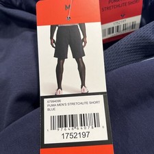 PUMA Shorts Men Medium Blue Stretchlite Logo ...
