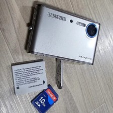 Samsung VLUU NV3 Digital Camera  Battery  SD Card Official