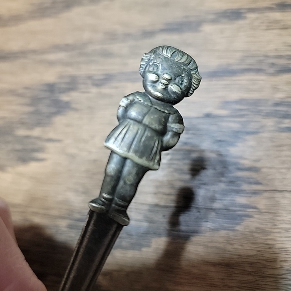 A 1960s Campbell Soup promo spoon featuring the iconic Soup Girl — a quirky, display-worthy piece of American advertising kitsch.