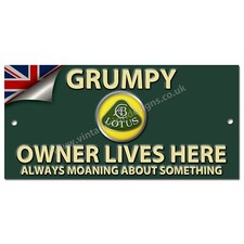 GRUMPY LOTUS OWNER LIVES HERE METAL SIGN. 8" X 3.5"