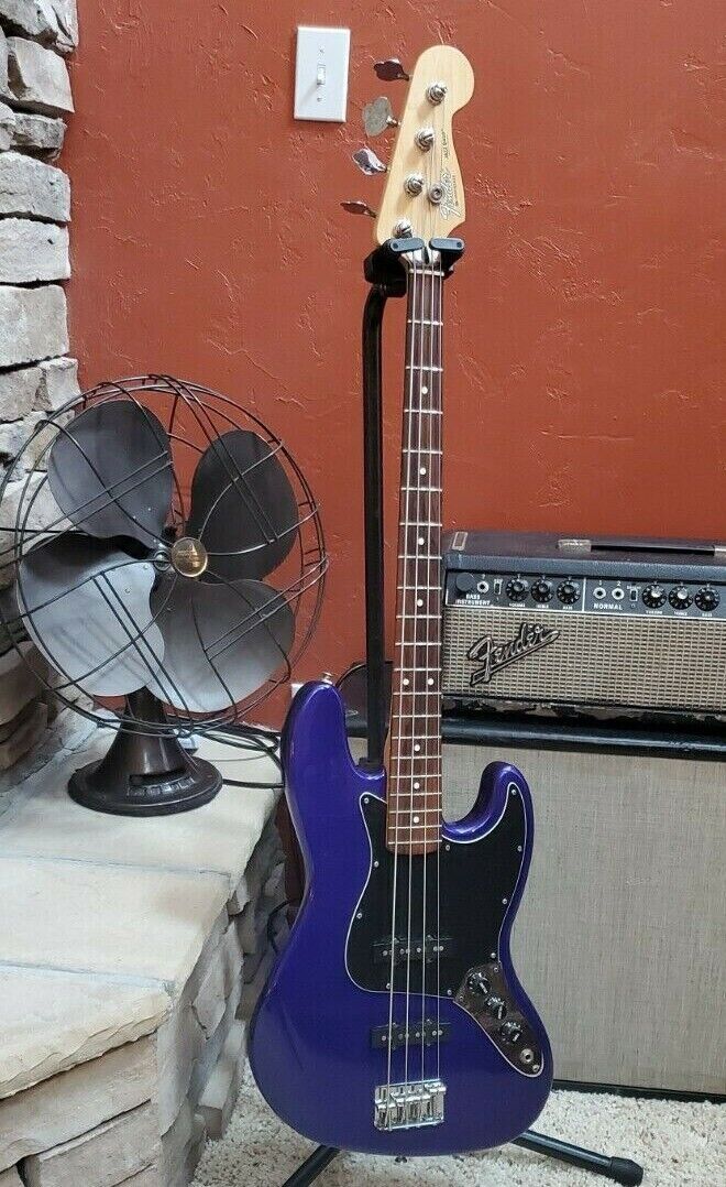 blue fender bass guitar