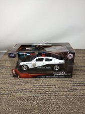 Coche A Escala Dodge Charger Police De Rápidos Y Furiosos – 1/24, Metal, Jada Toys (2022)