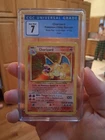 charizard spanish 1999 base set unlimited cgc 7 with evolutions to complete set.