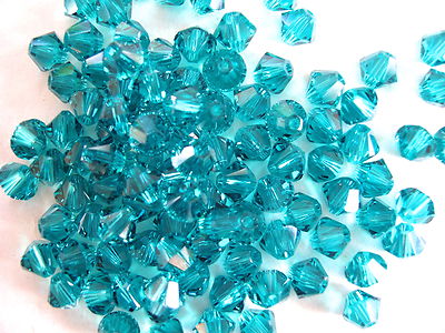 100 pc SWAROVSKI CRYSTAL BLUE ZIRCON 4mm Loose BEADS 5328 Bicones, December