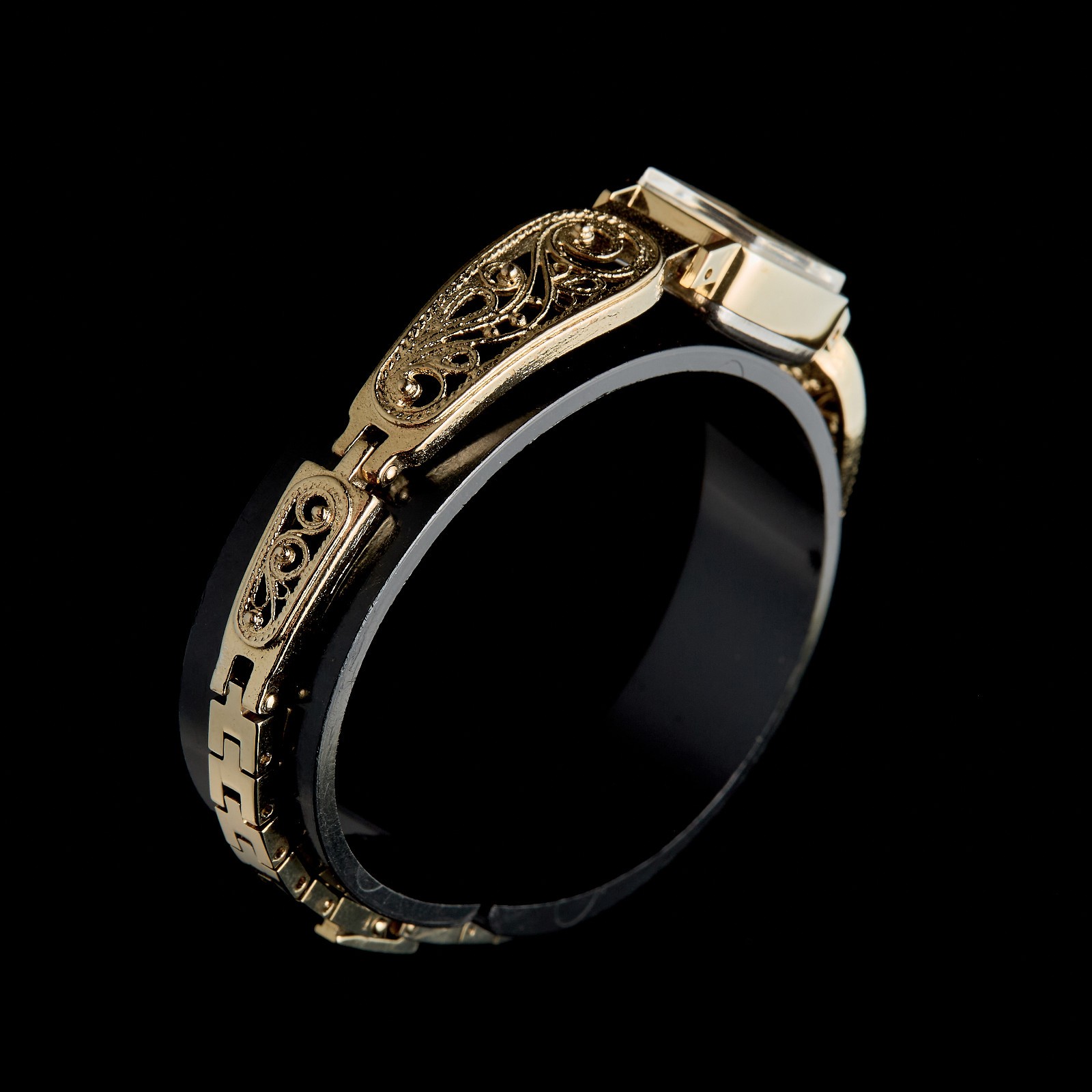 Small women's cocktail watch with gold color. Vintage women's mechanical watch.