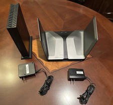 Netgear Nighthawk AX8 RAX80 and EAX20 Extender with power supplies