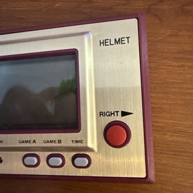 NINTENDO GAME & WATCH  HELMET  GOLD BOXED WITH MANUAL 1981 Working